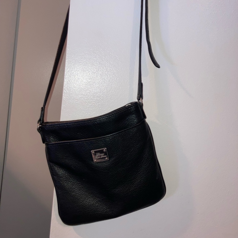 Black and silver Ralph Lauren crossbody bag. Fits wallet, keys, phone, etc.